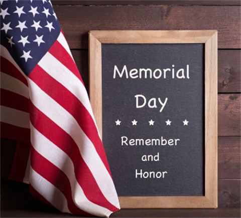 Flag and chalkboard with Memorial Day message